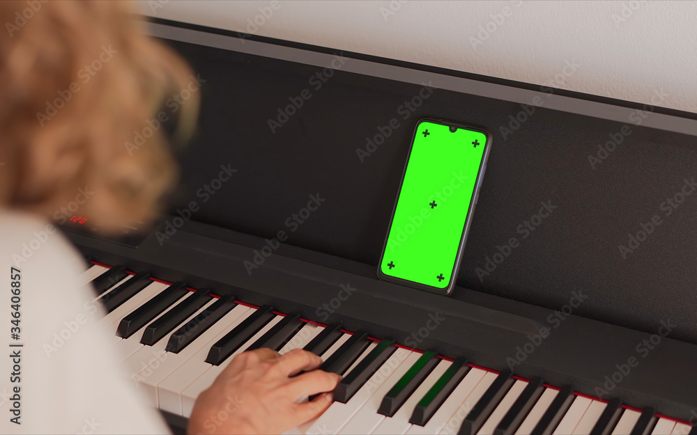 The idea for learning piano online by yourself at home. Blue Screen on the  wall for Background. Green Screen, Laptop screen and Computer, Mobile, or  Smartphone.3D Rendering. 6972931 Stock Video at Vecteezy