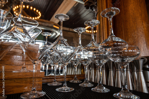 Glasses stack behind the bar 