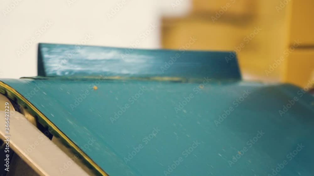 Conveyor system in factory, close up macro shot, 4K. Conveyor system in factory, close up macro shot, 4K.