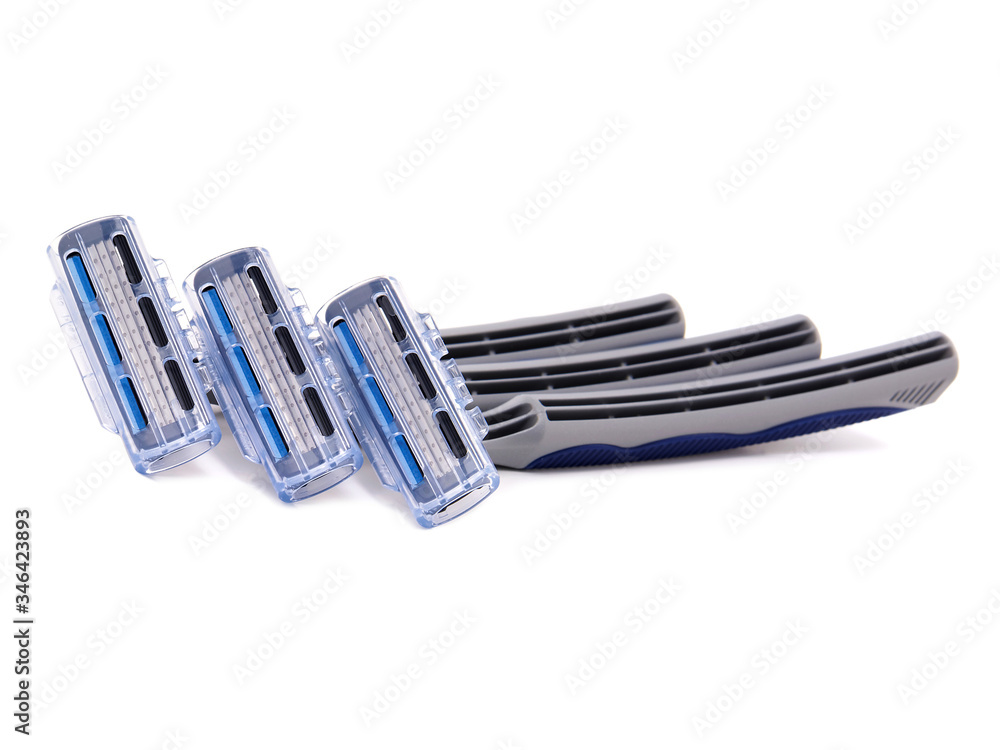 Disposable razors with three blades isolated on white Disposable razors with three blades isolated on white