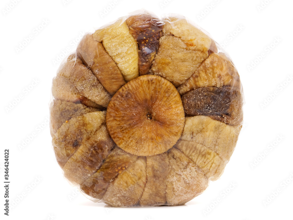 Round package of dried figs isolated on white Round package of dried figs isolated on white