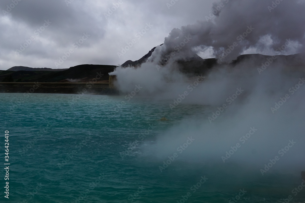 Blue volcanic lake and hor spring in Krafla caldera in North Iceland
