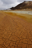 Cracked earth in geothermal area of Hverir under Namafell mountain
