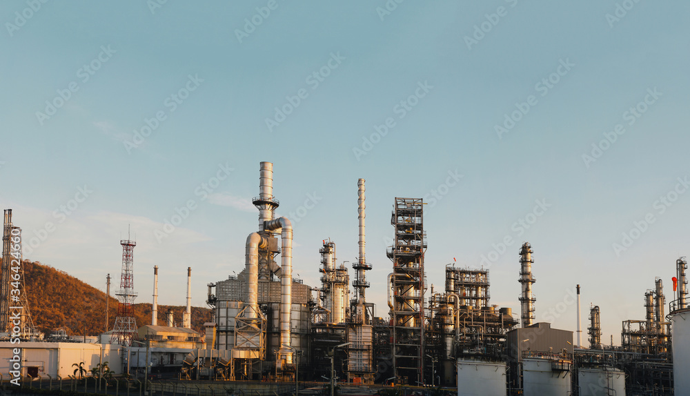 Panorama Oil and gas industrial, Refinery Oil storage tank and pipe line steel on morning sunlight background.