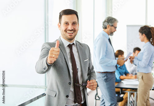 businessman office portrait corporate meeting leader thumb up man business