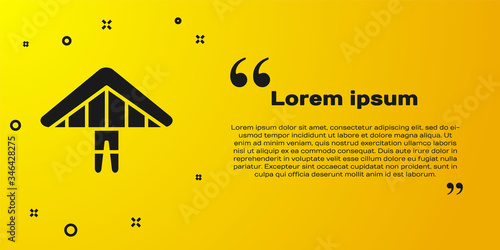 Black Hang glider icon isolated on yellow background. Extreme sport. Vector Illustration