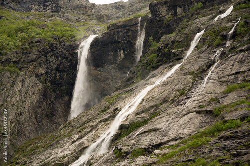 Krunefossen waterfall in Kjenndalsbreen valley and Lovatnet lake valley near Loen in Norway  © emil