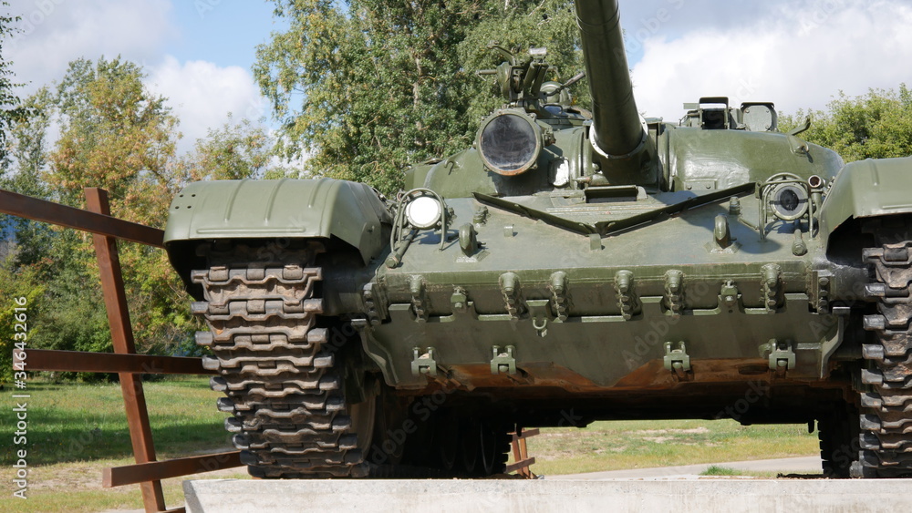 monument green tank t-72 in the summer during the daytime