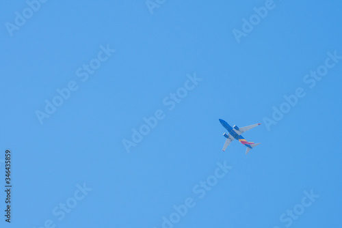 airplane flying in the sky of San Diego (USA)