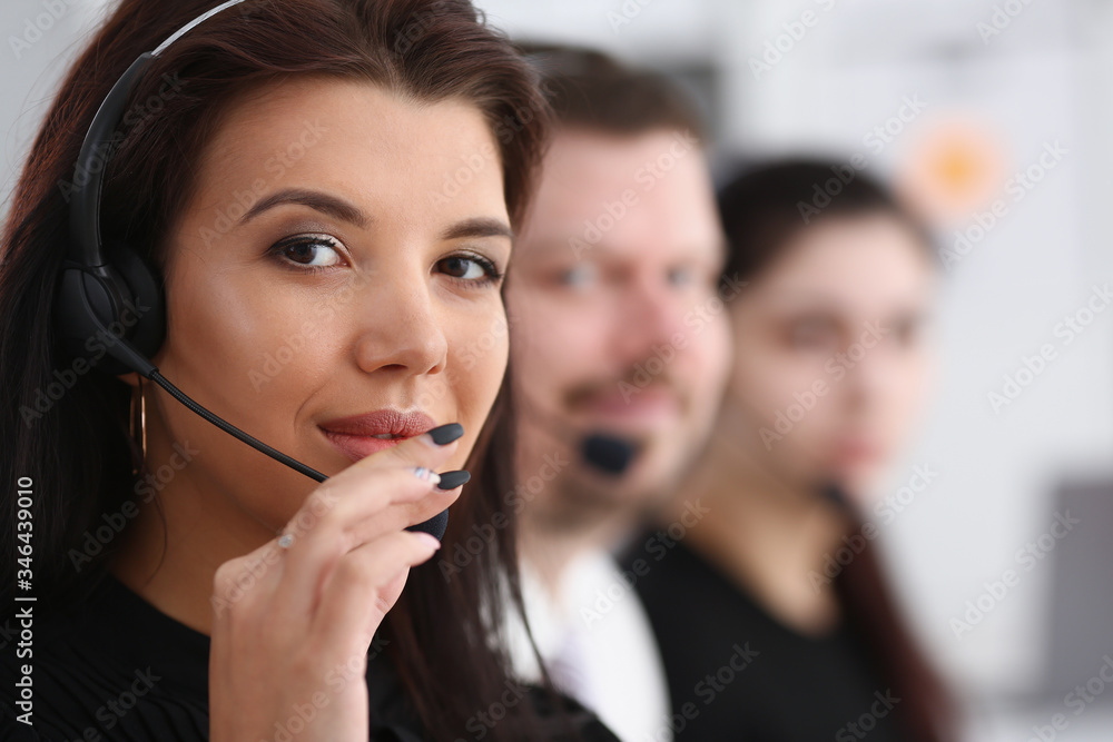 Three call centre service operators at work Three call centre service operators at work