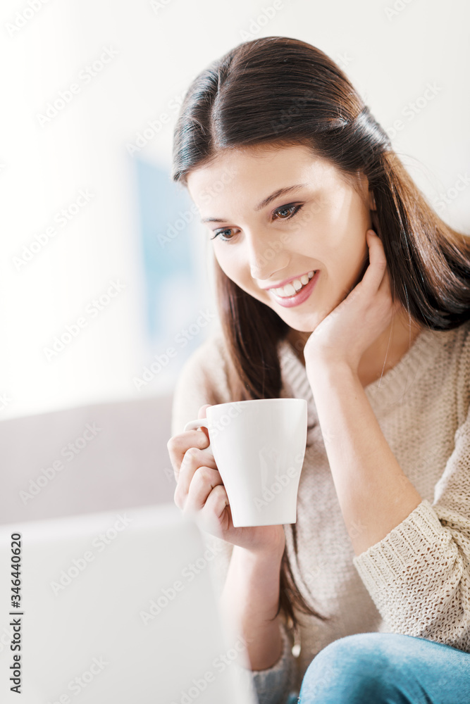 Girl watching a movie online Girl watching a movie online