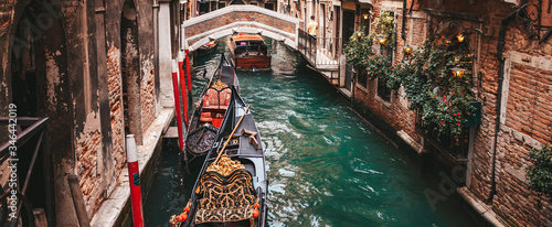 Canal with gondolas in Venice, Italy.