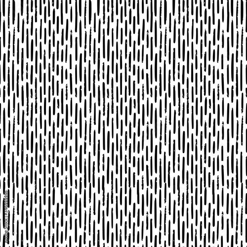 Hand-drawn black and white seamless texture with dashed strokes. Vector repeat pattern.