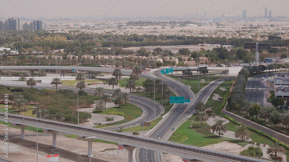 Aerial view of empty highway and interchange without cars in Dubai