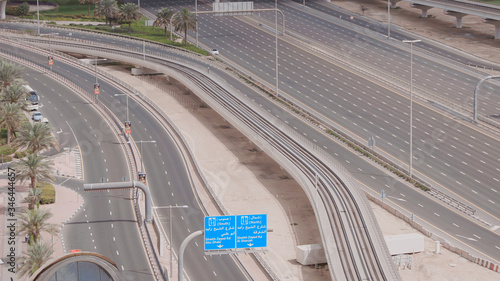 Aerial view of empty highway and interchange without cars in Dubai