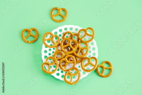 edible dried snack bagels in a white decorative plate