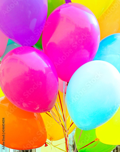 A lot of colorful balloons flying inflatable. Holiday. Childhood. Birthday. Gifts. Close-up. 
