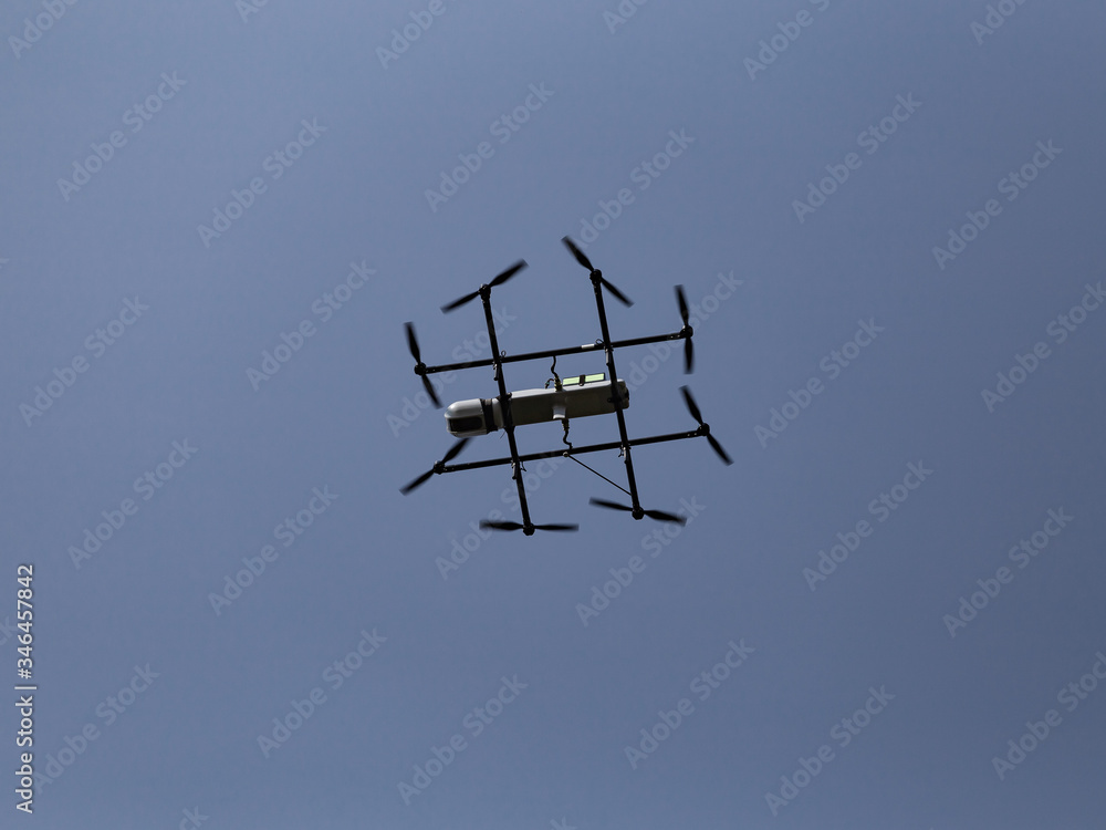 Oktokopter flies in the blue sky Oktokopter flies in the blue sky