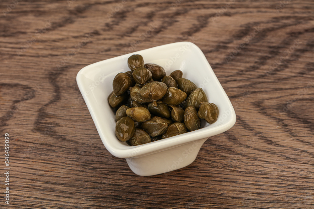 Tasty capers in the bowl Tasty capers in the bowl