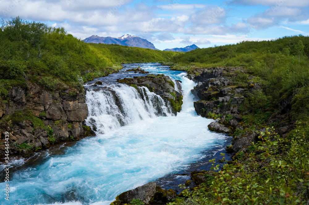 South Iceland Bruarfoss Waterfall with turquoise water flowing South Iceland Bruarfoss Waterfall with turquoise water flowing
