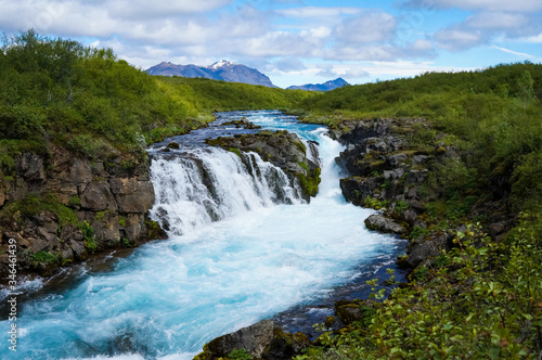 South Iceland Bruarfoss Waterfall with turquoise water flowing