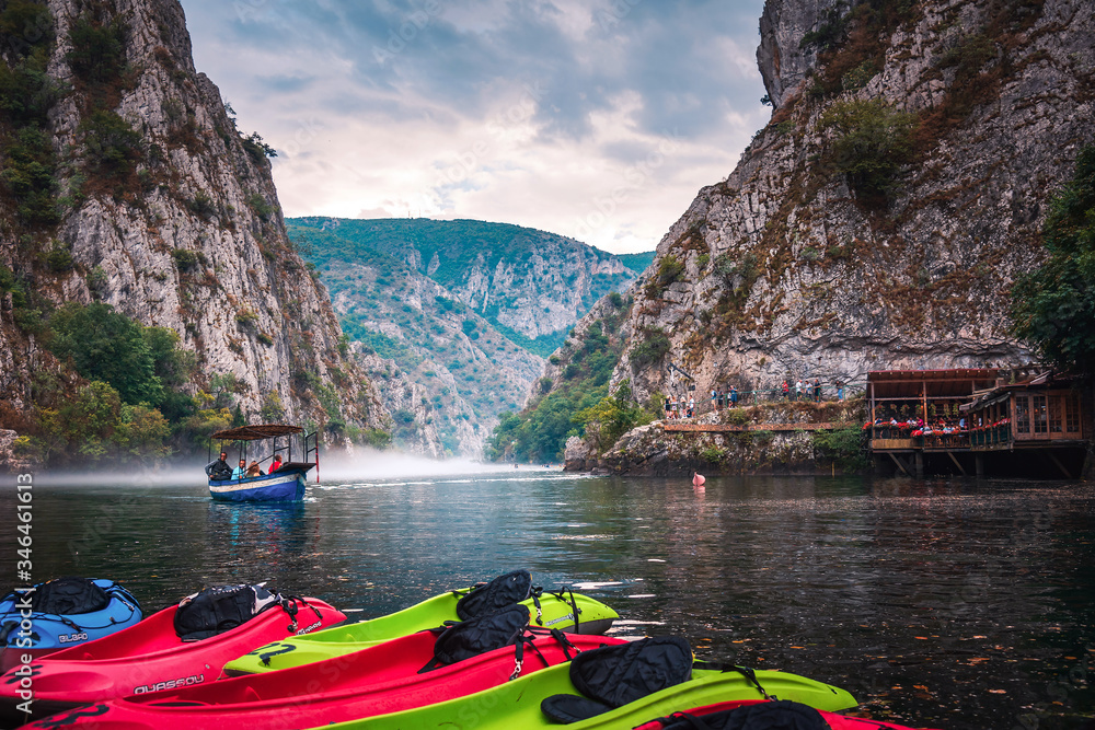 Φωτογραφία Canyon Matka near Skopje with people kayaking and amazing foggy scenery