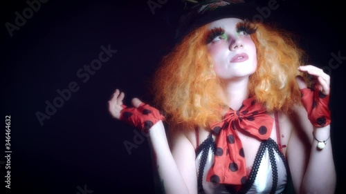 4k Woman Dressed up as Madhatter Posing Weird photo