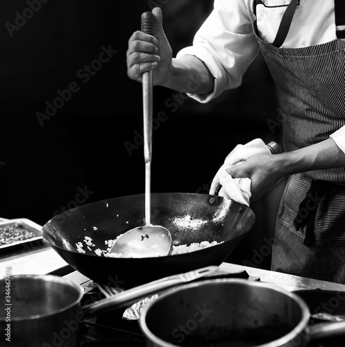 chef cooking in a kitchen, chef at work, Black & White