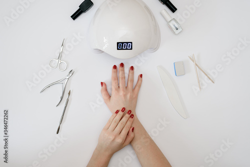 Tools for manicure hand in the hands