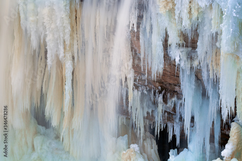 Winter landscape of frozen Upper Tahquamenon Falls, Tahquamenon Falls State Park, Michigan's Upper Peninsula, USA