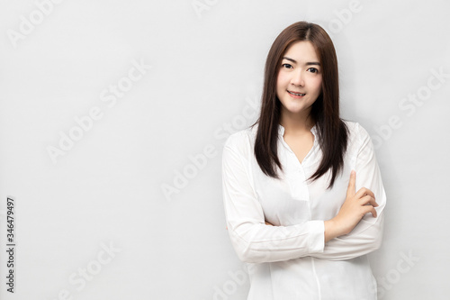 Cute asian woman in white shirt thinking and imagination.