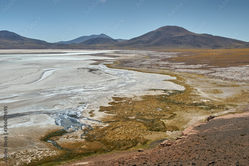 Wide view of Red Rock area.  Flamingos National Reserve Conaf. San Pedro de Atacama, Antofagasta - Chile. Desert. Andes Range & Route 23.