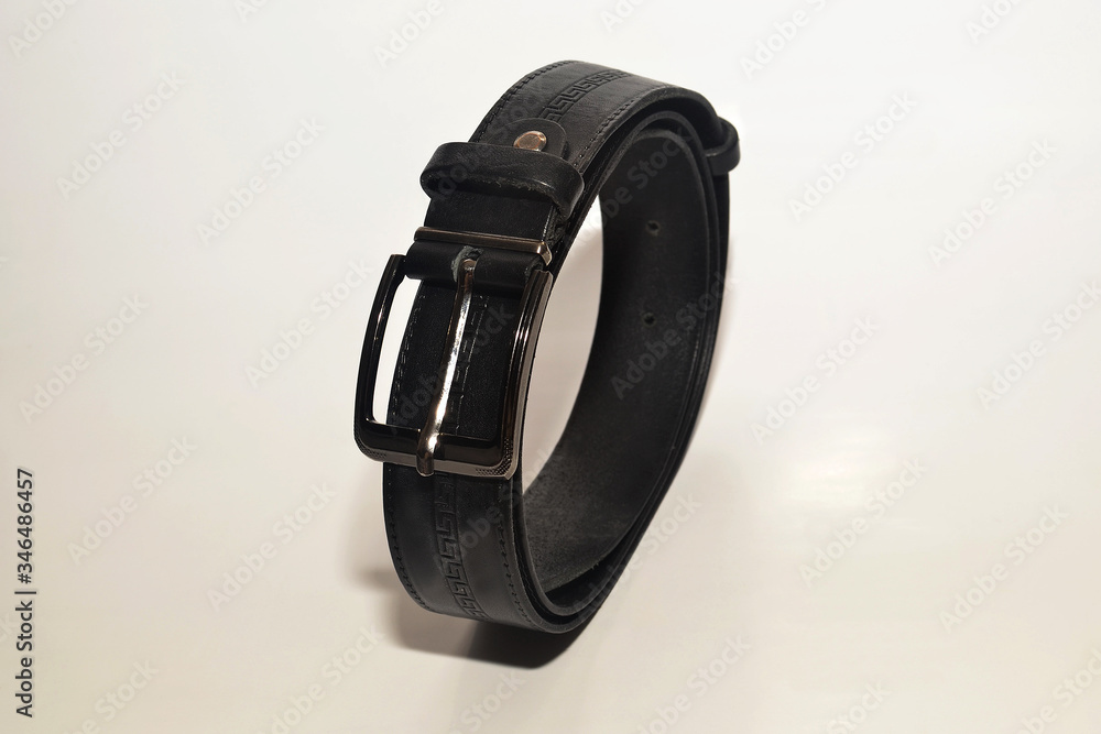 Black trouser belt on a white background isolate Black trouser belt on a white background isolate