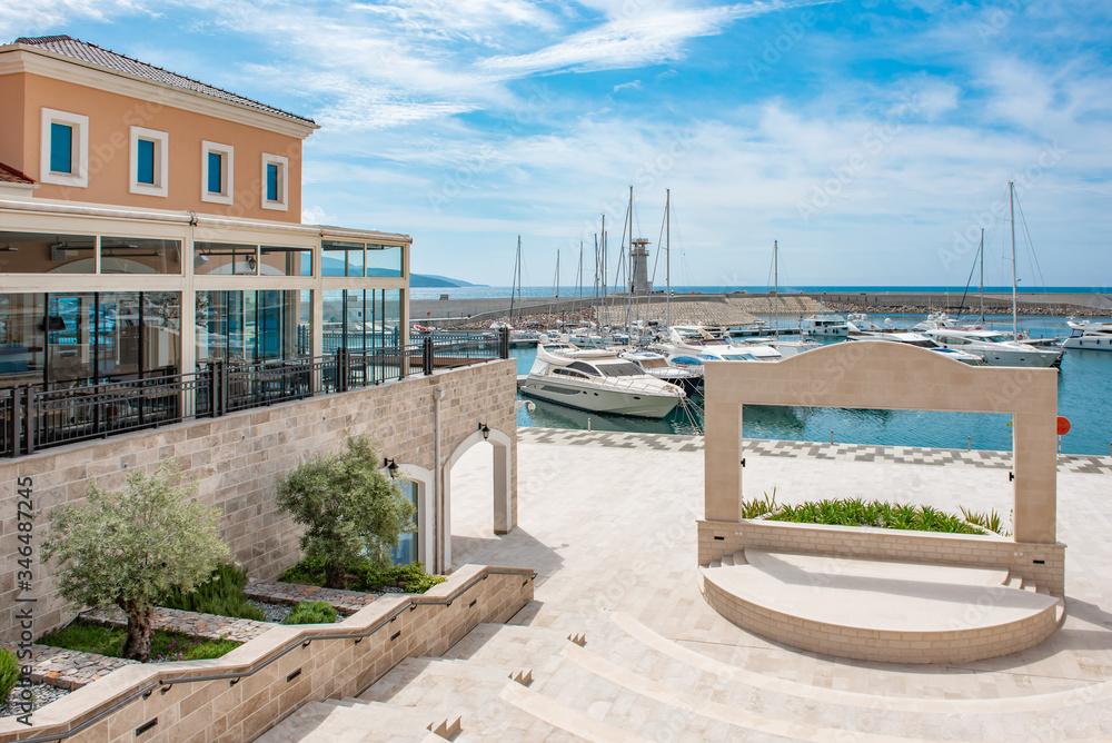 Fototapeta premium Beautiful view of residential buildings or modern architecture or residential area in Lustica Bay