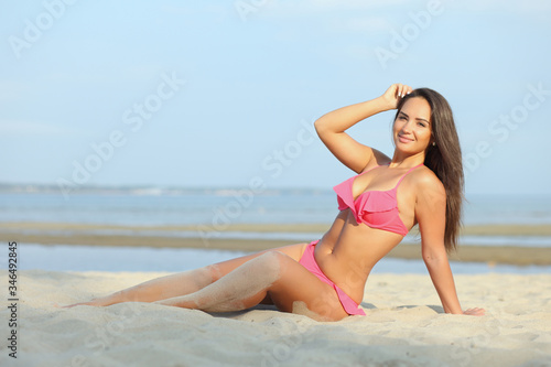 Beautiful girl in bikini on the beach