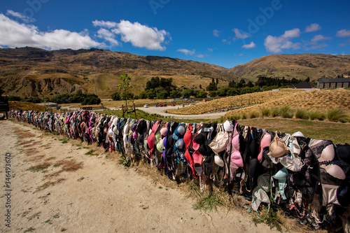 Central Otago,New Zealand - February 14,2020 : Cardrona Bra Fence gradually became a well known site as the number of bras grew to hundreds in Central Otago, New Zealand. New Zealand breast cancer fou photo