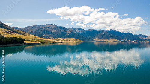 Reflection of lake Hawea in South island, New Zealand