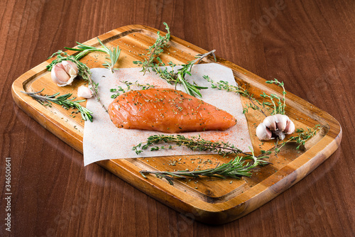 Fotografie, Obraz raw fillet with spices and rosemary for grilling