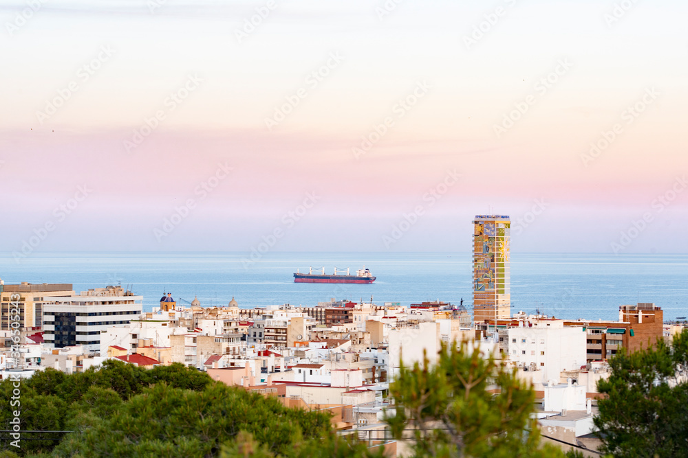 Panoramic view of Alicante, Valencian Community, Spain. The port in the background with the city on the shore