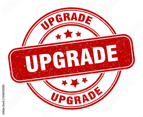 upgrade stamp. upgrade label. round grunge sign
