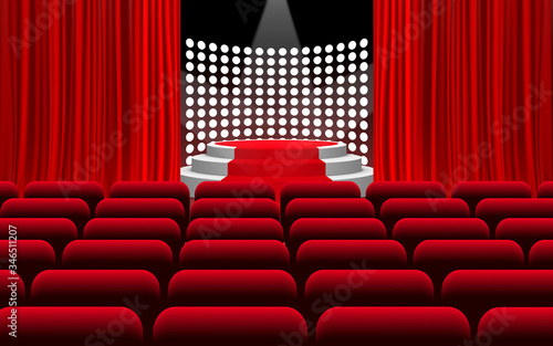 white podium and red carpet with spotlight on the stage in the hall
