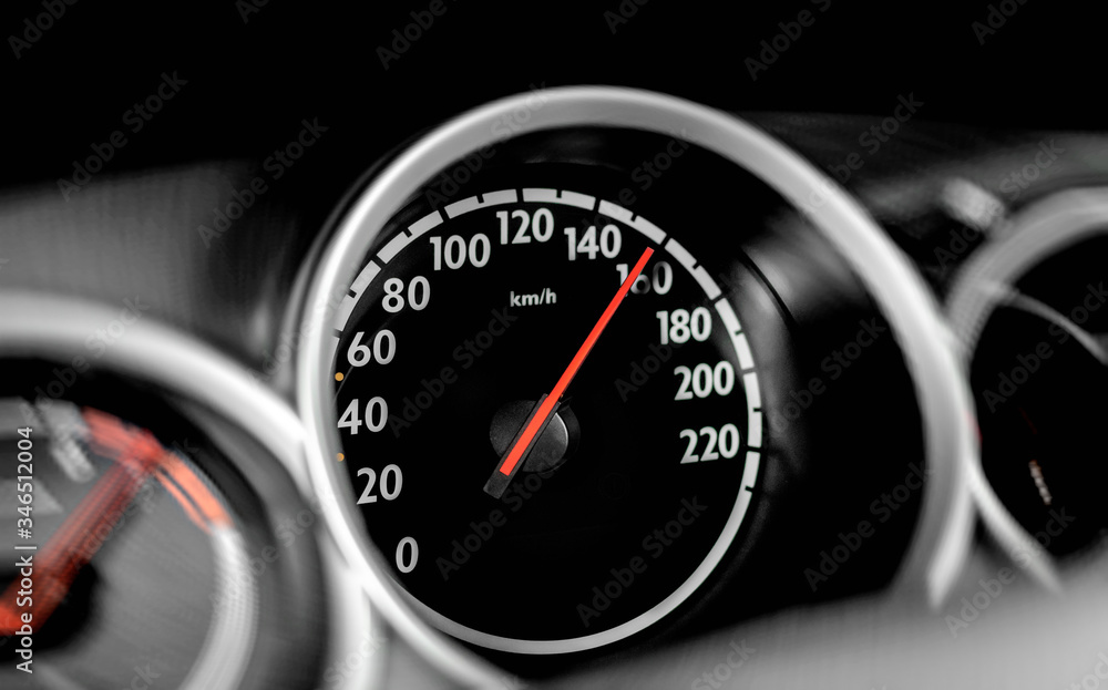 Car speedometer. High speed on a car speedometer and motion blur.