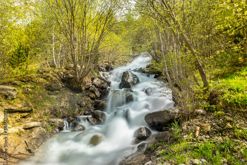 Waterfall in the Riu de la Bor in L Aldosa de Canillo in Andorra in spring.