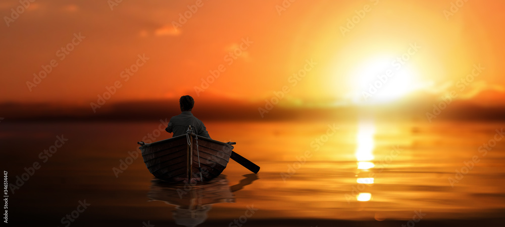 men ride on hand made boat at golden sunset lakeside.