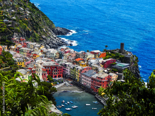 Views of Vernazza, Italy on the Cinque Terre coast from hiking path to Monterosso and ancient tower