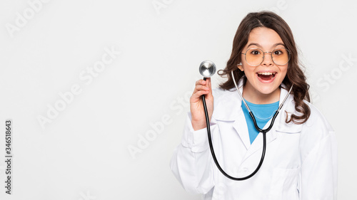 Young girl dressed as doctor