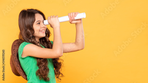 Copy-space girl with paper spyglass