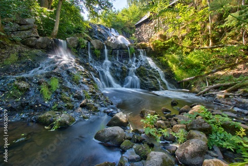 Fototapeta Naklejka Na Ścianę i Meble -  Waterfall in Röttle - Gränna at a natural reserve, Sweden