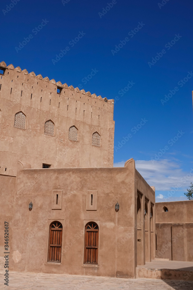 Courtyard of Jabreen Castle in Oman. Vertical Photo