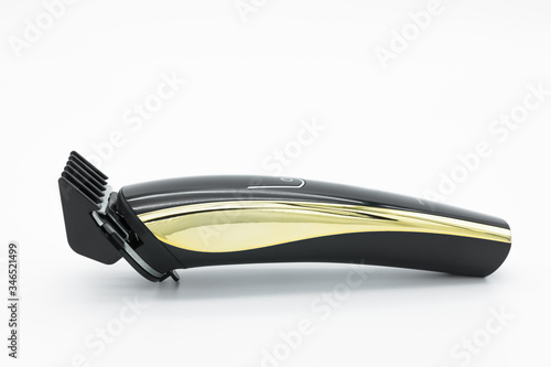 Close-up view of the cordless electric hair clipper isolated on the white background.